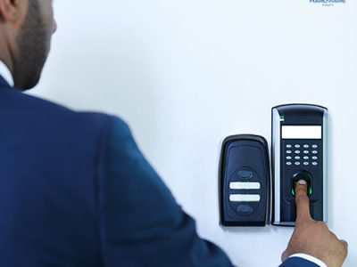 Employee using an Attendance Management System to log working hours and track absences.