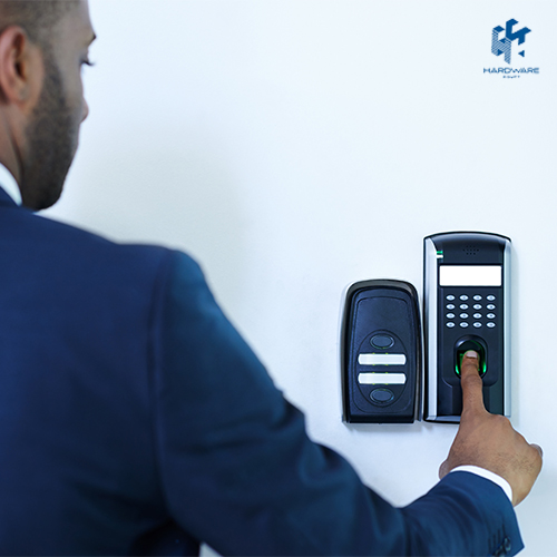 Employee using an Attendance Management System to log working hours and track absences.